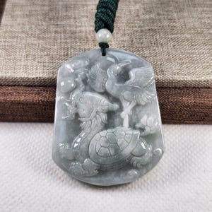 The Longevity of the Tortoise 龜鶴齊齡 and Crane well crafted natural jadeite jade pendant with necklace cord