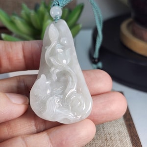 Well carved fish lotus carry out idiom 連年有餘untreated natural type A jadeite jade pendant with pretty necklace cord