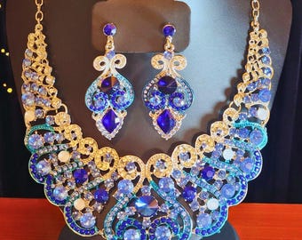 Conjunto de diamantes de imitación azul real para escenario, cine, desfile, drag y glamour.