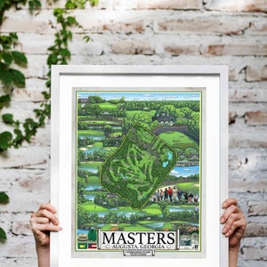 Peut inclure: Une illustration encadr&eacute;e de l'Augusta National Golf Club, qui accueille le tournoi des Masters. L'illustration montre le trac&eacute; du parcours, y compris les fairways verts embl&eacute;matiques et le club-house. Le texte "MASTERS AUGUSTA, GEORGIA ESTABLISHED IN 1934" est imprim&eacute; en bas de l'illustration.