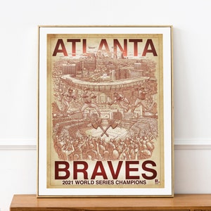 May include: A vintage-style poster with a red and white color scheme featuring the Atlanta Braves logo and the text "Atlanta Braves 2021 World Series Champions". The poster depicts a baseball field with players in action and a crowd of fans cheering.