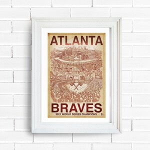 May include: A vintage-style poster with a red and white color scheme featuring a drawing of the Atlanta Braves baseball team. The poster reads "Atlanta Braves 2021 World Series Champions".