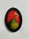 Funny Frog Smoking Painting Wooden Wall Art, Quirky Animal Decor, Oval Frame Pop Art Style, Unique Humor Gift Idea product logo