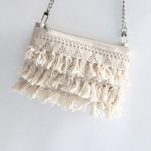 Cute summer crossbody bag with macrame fringe.