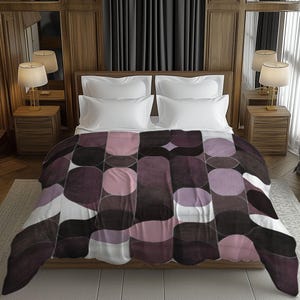 May include: A bed with white bedding and a patterned blanket. The blanket features a geometric design with oval and rectangular shapes in shades of purple, black, and white. The bed is in a room with wooden paneling and dark curtains.