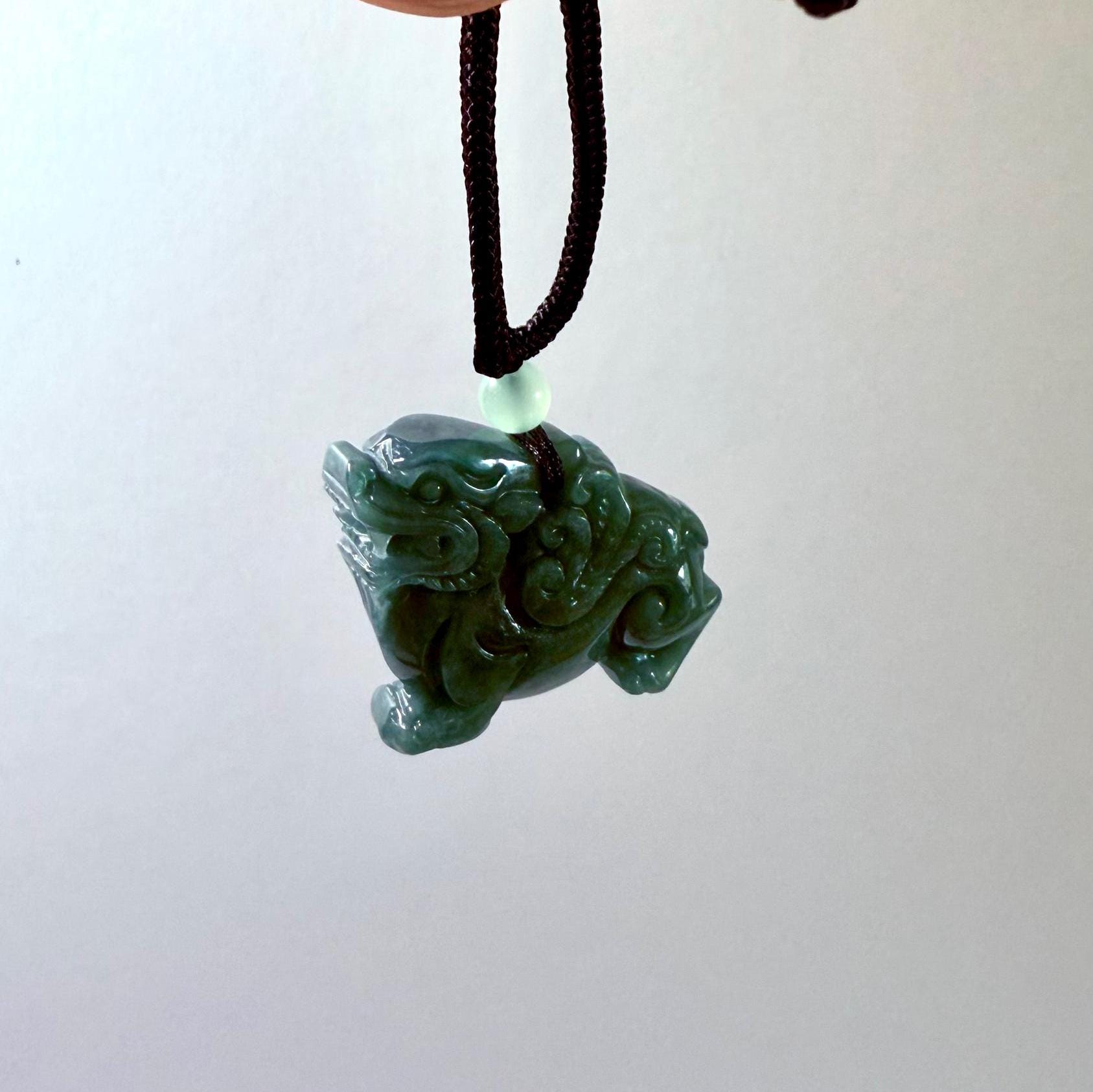 Tiger Dragon Pendant Jadeite. The Combination of the Tiger and Dragon are Ancient Symbols of Yin and Yang, Green Carved Jade Pendant.