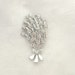 see more listings in the Brooches/pins section