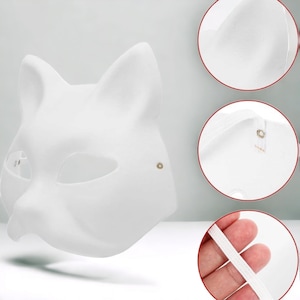May include: White blank cat mask with elastic straps. The mask has eye holes and a nose cutout. The mask is made of a smooth, lightweight material.