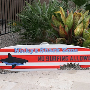 Shark bite Surfboard wall art - distressed, personalized four foot shark surfboard for beach house or kids room