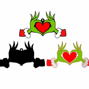 May include: Green hand silhouette making a heart shape with a red heart inside. The hands are wearing red and white trim. The image is a silhouette of the Grinch making a heart shape.