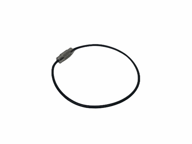 May include: A black key ring with a silver metal clasp.