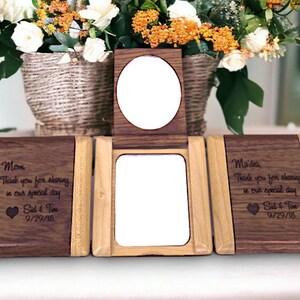 May include: Three wooden boxes with engraved messages. Each box has a small mirror inside. The boxes are engraved with the text "Mom, Thank you for sharing in our special day, Sid & Tom, 9/29/18" and "Madea, Thank you for sharing in our special day, Sid & Tom, 9/29/18".