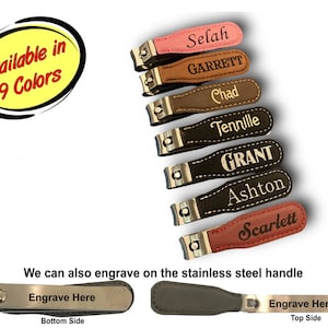 May include: Nine personalized nail clippers with leather covers in various colors. The covers are engraved with names such as Selah, Garrett, Chad, Tennille, Grant, Ashton, and Scarlett. The clippers can also be engraved on the stainless steel handle.