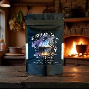 May include: A black tea bag with a label that reads "Traditional Witches Brew Ritual Tea." The label features a cauldron with smoke and flames. The text "Old World Brewing" and "Authentic, Organic, Caffeine Free" are also visible.