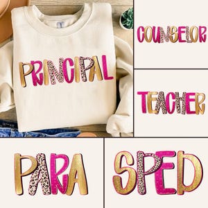 May include: Cream-coloured sweatshirt featuring the word "PRINCIPAL" in pink, gold, and leopard print. Other images display "COUNSELOR", "TEACHER", "PARA", and "SPED" in a similar style. The design is suitable for school staff.