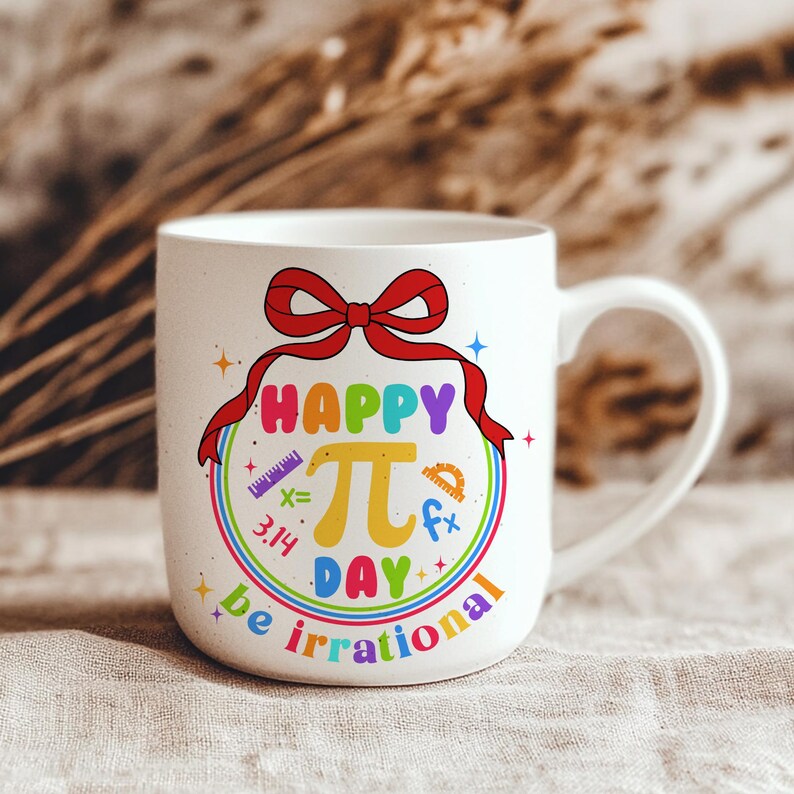 May include: White ceramic mug with a rainbow design and the text "Happy Pi Day be irrational". The design includes a large pi symbol, a ruler, a protractor, and the number 3.14.