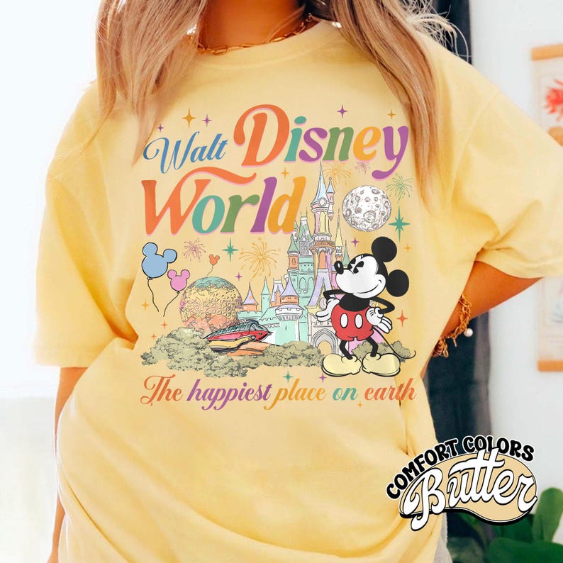 May include: A white ceramic mug with a black handle and the text "But First, Coffee" in a handwritten style. The mug is on a white surface. The mug is approximately 4 inches tall.