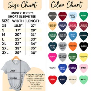 May include: A light gray unisex short sleeve tee shirt with a size chart and color chart. The size chart lists sizes XS to 3XL with width and length measurements in inches. The color chart shows various colors like black, pink, and navy.