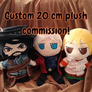 May include: Three custom plush dolls, each approximately 20 cm tall, are displayed. The dolls feature detailed facial expressions and clothing, with one wearing a hat and denim jacket. The text "Custom 20 cm plush commission!" is above the dolls.