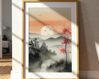 May include: Framed art print featuring a serene landscape with a sunset. The artwork depicts mountains, trees, and a river in muted tones, with a vibrant orange and yellow sky. The frame is a light wood color, adding a natural touch to the decor.