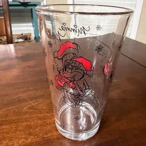 May include: A handmade wooden sign with the text "Welcome" in a playful font. The sign features a distressed finish and a simple, rustic design, perfect for a front door or entryway. The sign is rectangular and has a natural wood color.