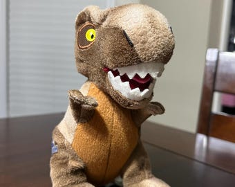 Schmidt Spiele Jurassic World, T-Rex 42755 - Peluche 15 Cm - Foto 13