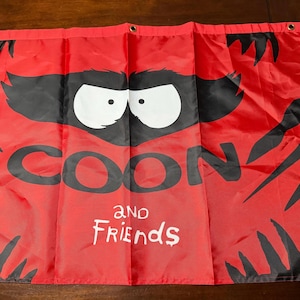 May include: A set of three ceramic mugs with a speckled, matte finish. The mugs are in shades of cream, light gray, and dark gray. Each mug has a simple, minimalist design and a rounded handle.