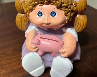 キャベツ畑の貯金箱 1984 キャベツ畑の人形の貯金箱 ビニール