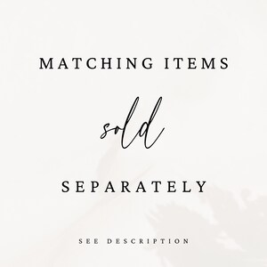 May include: A minimalist graphic with the words "MATCHING ITEMS" above the cursive word "sold" and the word "SEPARATELY" below. The text "SEE DESCRIPTION" is at the bottom.