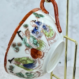 Antique Chinese Porcelain Teacup: Hand-Painted Storytelling Design