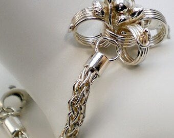 Handmade, solid silver flower bracelet with chunky double fox tail chain.  A perfect anniversary gift, measuring 7 3/4”