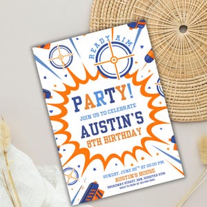 May include: A white invitation with blue and orange graphics, including targets and toy guns. The invitation reads "READY AIM PARTY!" and announces Austin's 8th birthday, with date, time, and location details.
