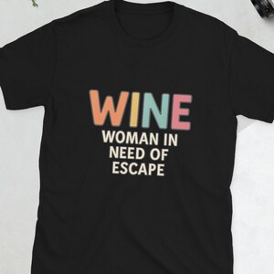 WINE Woman In Need of Escape T-Shirt – Funny Wine Shirt for Women, Relaxation Tee for Moms, Wine Lover Gift, Soft Graphic Tee