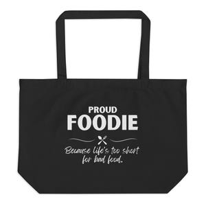 May include: Black tote bag with white text that reads "Proud Foodie Because life's too short for bad food."