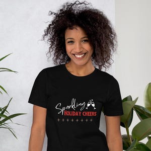 Sparkling Holiday Cheers Festive T-Shirt – Christmas Themed T-Shirt for Wine Lovers – Perfect Holiday Gift for Sparkling Wine Enthusiasts