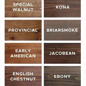 May include: A grid of eleven rectangular wood stain samples showing various shades from light tan to dark black. Each sample features visible wood grain and white text labels including Honey Maple, Dark Walnut, Special Walnut, Kona, Provincial, Briarsmoke, Early American, Jacobean, English Chestnut, Ebony, True Black, and Modern Oak.