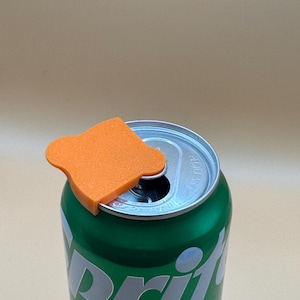 Safety Can Cover: Prevent things from getting in your drink. Many colour options available. Fits on most cans. Helps identify drink.