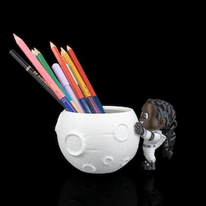 Reach for the Stars with Our Magnetic Moon & Astronaut Trinket!