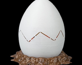 Unearth the Magic: The Hatching Dinosaur Egg Statue!