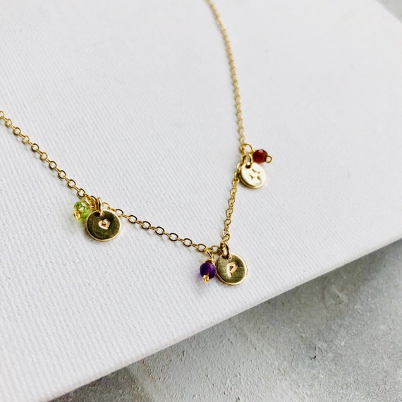 18-Inch Rhodium Plated Necklace with 6mm Peridot Birthstone Beads and Sterling Silver Confirmation Heart Charm.