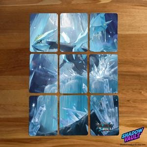 May include: Nine trading cards featuring a blue and white icy landscape with a creature. The cards have a fantasy theme, with a logo that says "BLACK BOLT" and "SHADOW VAULT" in the bottom right corner.