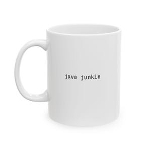 May include: A white ceramic coffee mug with a curved handle. The mug has the words "java junkie" printed in black, centered on the front. The mug is empty and sits against a white background.