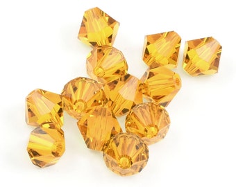 12 6mm TOPAZ Swarovski Crystal Beads - 5328 Xilion Bicone Beads - 6mm Beads in Warm Amber Brown