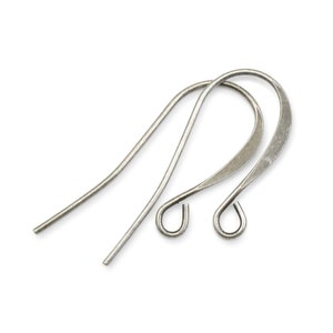 May include: Two silver-toned earring hooks, each with a curved shape and a small loop at the end.