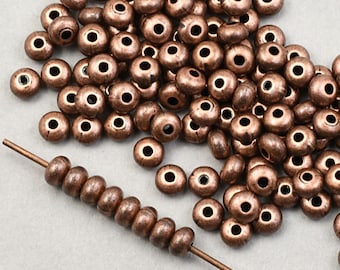 144+ Beads - 3mm x 2mm Donut Beads - Small ANTIQUE COPPER Beads - Dark Copper Plated Tiny Spacer Beads Heishi Torus Curved Disks   #FB115