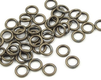 50 BAGUEs de saut FERMÉEs 5mm 19 Gauge 19g Antique Brass Jump Ring Findings Soldered Shut Brass Jumprings Bronze Findings (FSAB47)