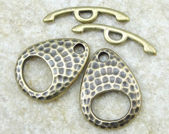 TierraCast Toggles - Antique Brass Toggle Findings - Tierra Cast HAMMERTONE ELLIPSE Toggle Clasp Findings Brass Oxide Bronze (PAF4)