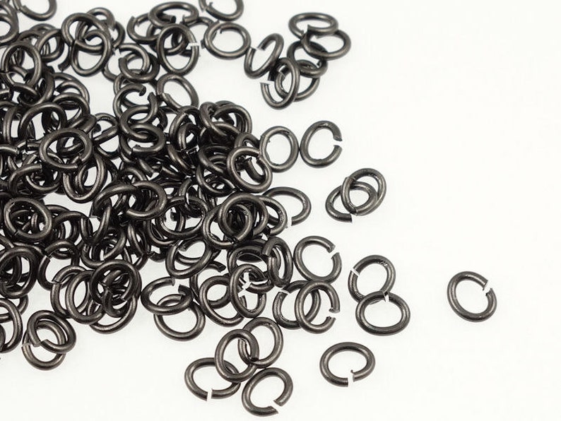 250 TierraCast Small Oval Jumprings 3mm x 5mm 20 g 20 gauge Black Oxide Jump Ring Findings PH16 image 1