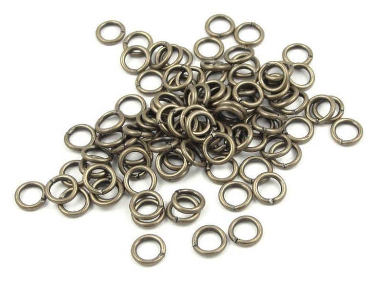 100 Jumprings 5mm 19 Gauge Antique Brass Jumpring Findings Aged Solid Brass Jump Rings 19 g 19g FSAB46 image 1