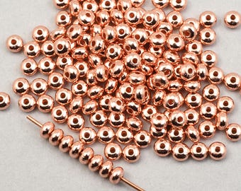 144+ Beads - 3mm x 2mm Donut Beads - Small BRIGHT COPPER Beads - Copper Plated Tiny Spacer Beads Heishi Torus Curved Disk Beads   FB115